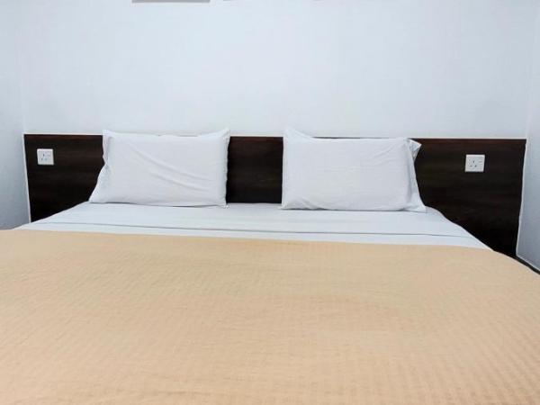 Api-Api GuestHouse : photo 2 de la chambre chambre lit king-size deluxe