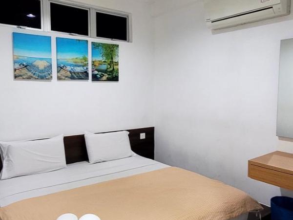 Api-Api GuestHouse : photo 10 de la chambre chambre lit king-size deluxe