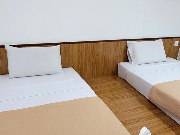 Api-Api GuestHouse : photo 6 de la chambre chambre lits jumeaux standard