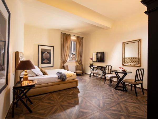 Palazzo Martellini Residenza d'epoca : photo 9 de la chambre chambre double ou lits jumeaux supérieure