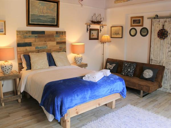 Geronimo Guest House Belém : photo 1 de la chambre suite avec accès au spa