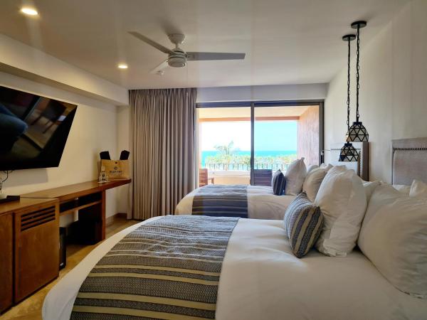 Zoetry Casa del Mar Los Cabos : photo 1 de la chambre chambre deluxe avec bain à remous et lits doubles - vue sur océan