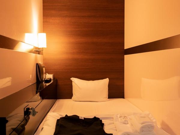 First Cabin Haneda Terminal 1 : photo 1 de la chambre cabine classe affaires - réservée aux hommes