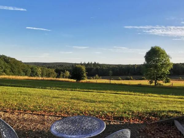 La Villa du Pré Du Cerf : photo 5 de la chambre chambre lit queen-size - vue sur jardin