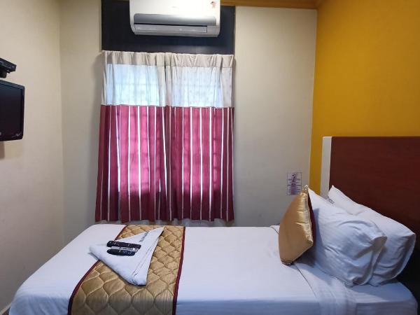 Skyry Hotels Adyar : photo 3 de la chambre chambre simple deluxe