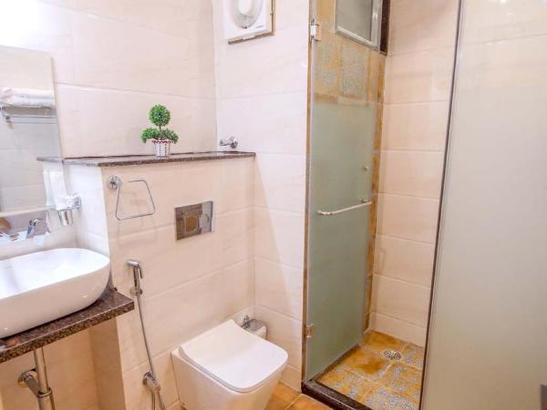 Gems Suites-A Boutique Stay : photo 4 de la chambre chambre double deluxe avec balcon