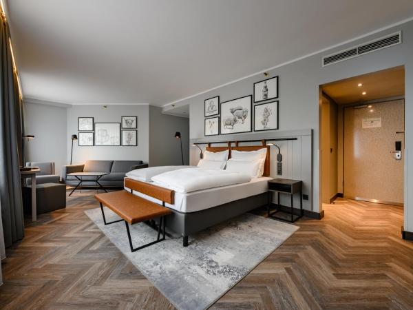 Mercure Hotel Dortmund Centrum : photo 1 de la chambre chambre privilège avec 1 lit king size