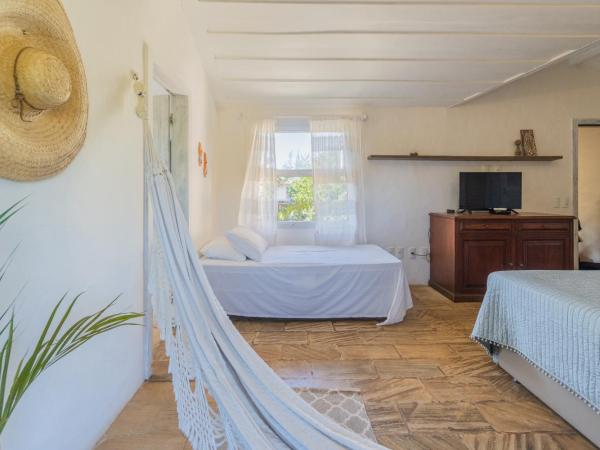 Morada do Sol Guest House : photo 1 de la chambre chambre familiale supérieure