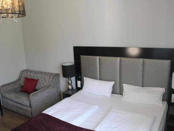 Arena Villa am Wasserpark : photo 5 de la chambre chambre familiale