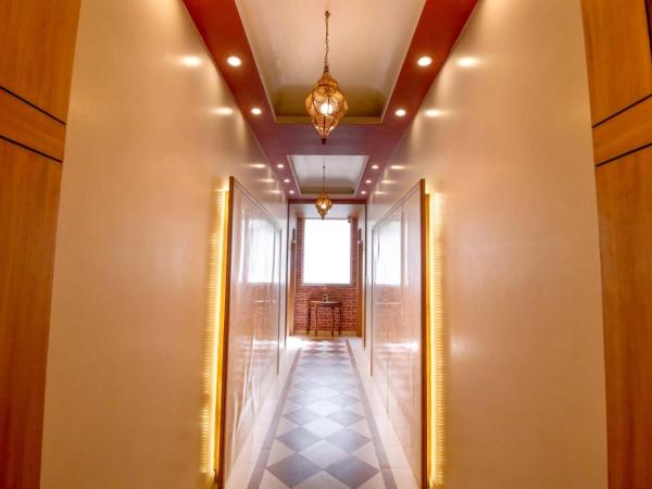 Gems Suites-A Boutique Stay : photo 10 de la chambre chambre double deluxe avec balcon