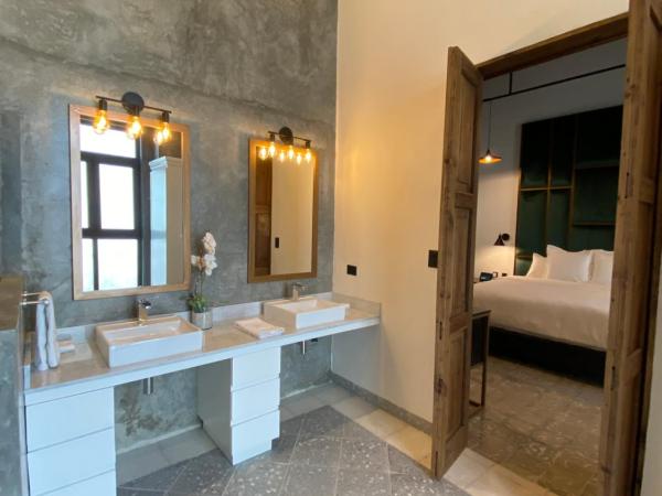 Milo Collection Hotel : photo 4 de la chambre suite lit queen-size