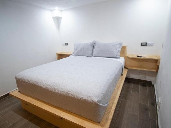 El Jardín de la Abuela : photo 9 de la chambre chambre deluxe avec 2 lits queen-size