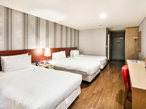 Ramada Hotel and Suites Seoul Namdaemun : photo 2 de la chambre chambre triple de luxe