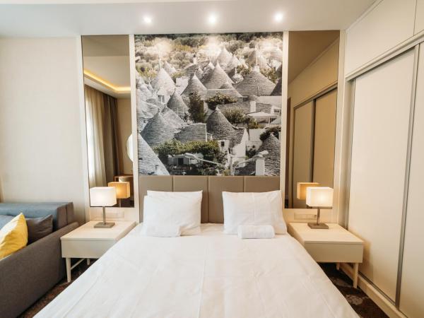 Lábasház Debrecen : photo 2 de la chambre chambre lit king-size