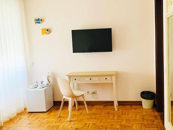 Senhor Gigi : photo 6 de la chambre chambre double ou lits jumeaux deluxe – vue sur jardin