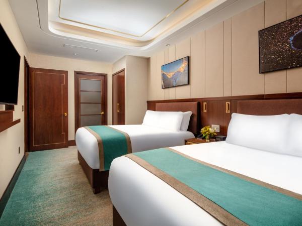 Blossom Hotel Houston : photo 1 de la chambre deluxe 2 queens one bedroom suite