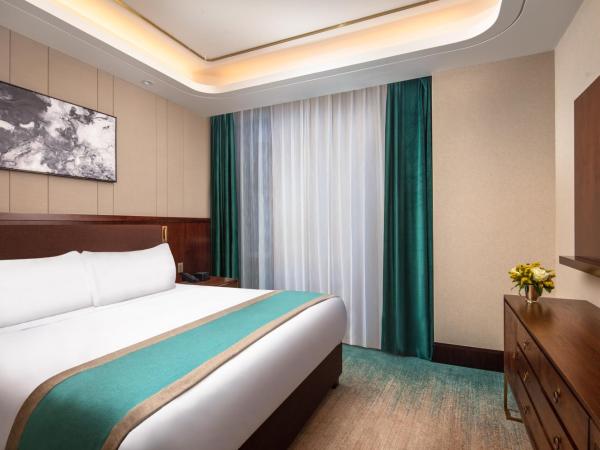 Blossom Hotel Houston : photo 2 de la chambre deluxe 2 kings two bedrooms suite