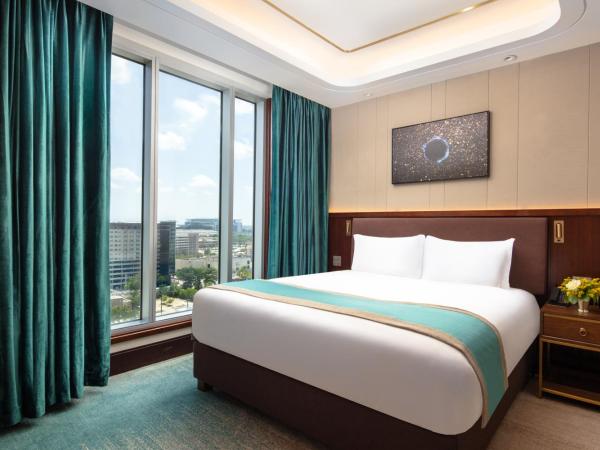 Blossom Hotel Houston : photo 1 de la chambre deluxe 1 king one bedroom suite