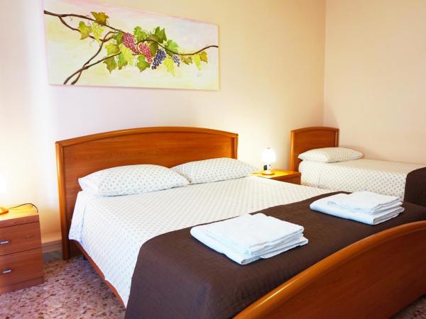 B&B Piazza 300mila : photo 4 de la chambre chambre triple