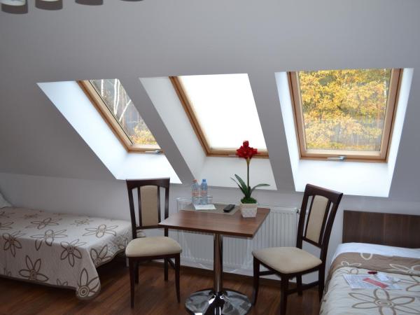 Kalinowy Sen : photo 7 de la chambre chambre triple avec salle de bains commune