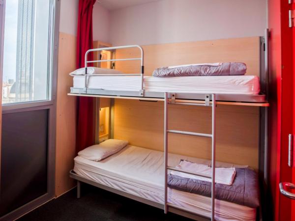 Urbany Hostel Barcelona : photo 4 de la chambre lit simple dans dortoir pour femmes