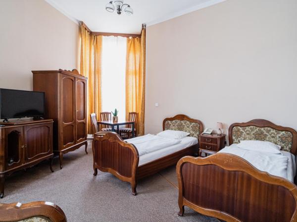 Hotel Polonia : photo 1 de la chambre chambre triple familiale