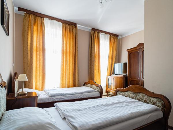 Hotel Polonia : photo 5 de la chambre chambre lits jumeaux