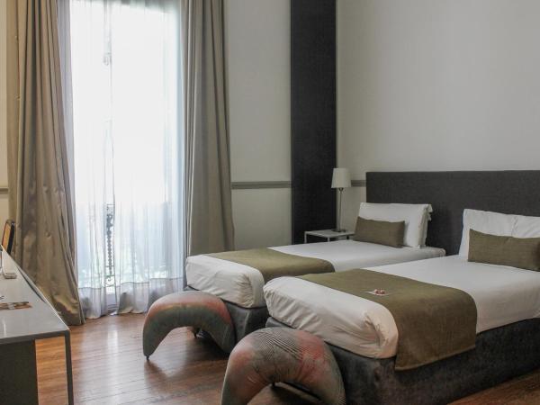 Esplendor by Wyndham Savoy Rosario : photo 6 de la chambre chambre lits jumeaux supérieure