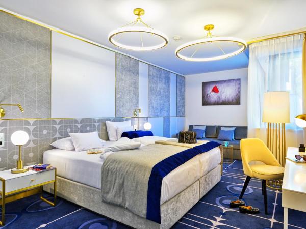 Hotel Ferreus Modern Art Deco : photo 1 de la chambre chambre familiale deluxe