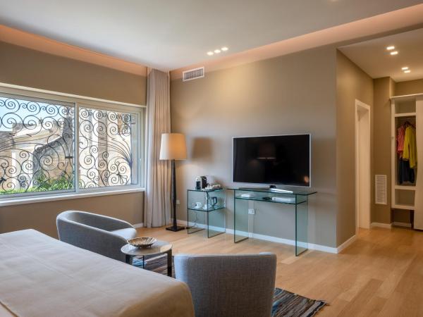 La Fiermontina Palazzo Bozzi Corso Hotel : photo 1 de la chambre suite junior - vue sur ville