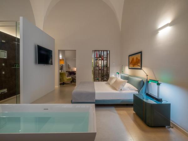La Fiermontina Palazzo Bozzi Corso Hotel : photo 8 de la chambre wellness suite with bath