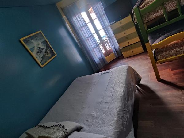 Hostel Ruca Potu : photo 3 de la chambre chambre quadruple avec salle de bains commune