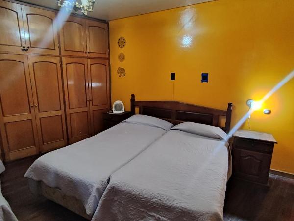 Hostel Ruca Potu : photo 3 de la chambre chambre triple avec salle de bains privative
