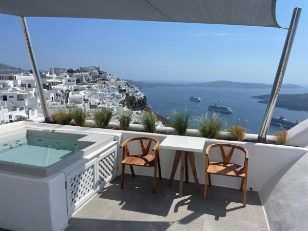 Nomikos Villas : photo 2 de la chambre suite supérieure avec vue sur la caldeira