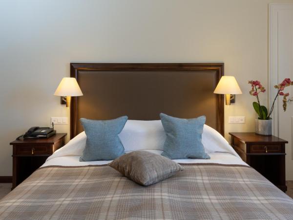 Suvretta House : photo 1 de la chambre chambre double ou lits jumeaux supérieure - vue sur lac