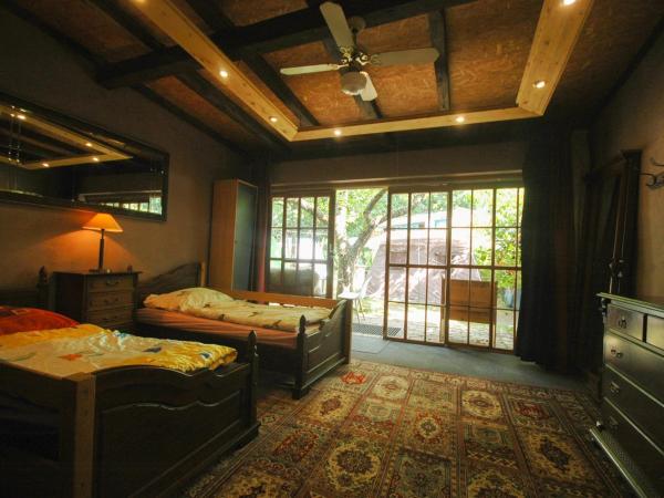 Sandino Hostel - Solo Traveler Sanctuary : photo 2 de la chambre chambre lits jumeaux standard