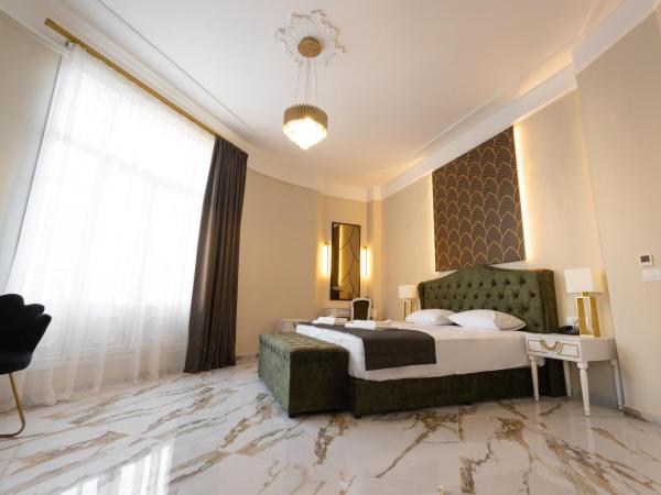 Modern Revival Luxury Hotel : photo 2 de la chambre suite deluxe avec baignoire spa