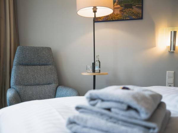 Hotel in Herrenhausen : photo 2 de la chambre chambre simple