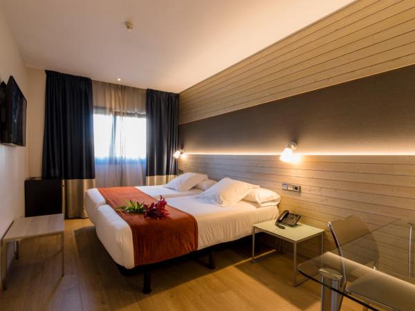 Hotel Avenida : photo 3 de la chambre chambre double ou lits jumeaux