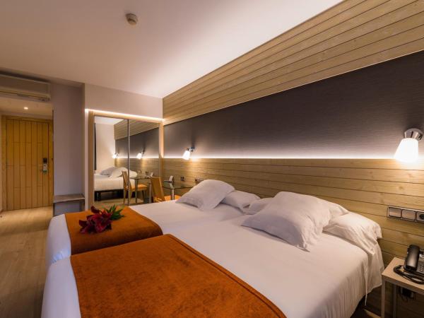 Hotel Avenida : photo 1 de la chambre chambre double ou lits jumeaux