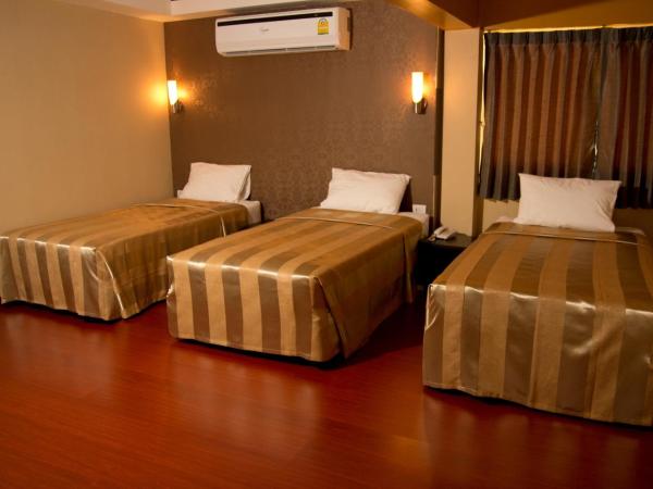 Visiting Card Hotel & Resort : photo 1 de la chambre chambre familiale