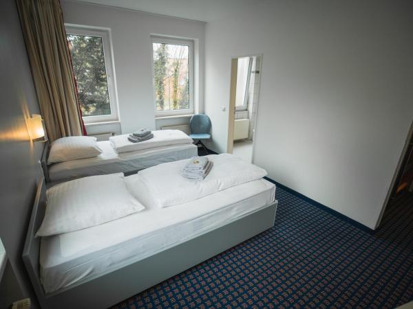 Hotel in Herrenhausen : photo 3 de la chambre chambre lits jumeaux