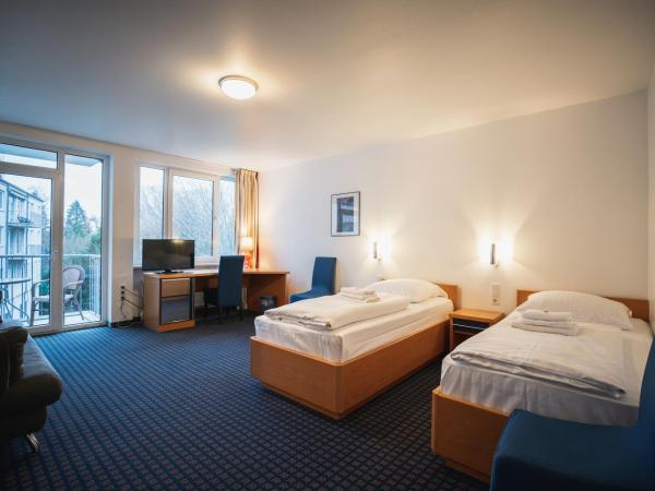 Hotel in Herrenhausen : photo 8 de la chambre chambre lits jumeaux