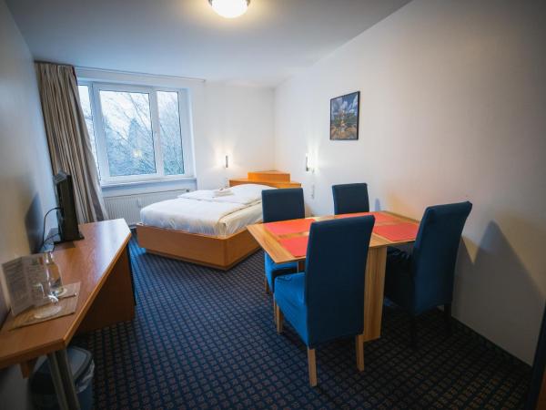 Hotel in Herrenhausen : photo 4 de la chambre appartement 3 chambres