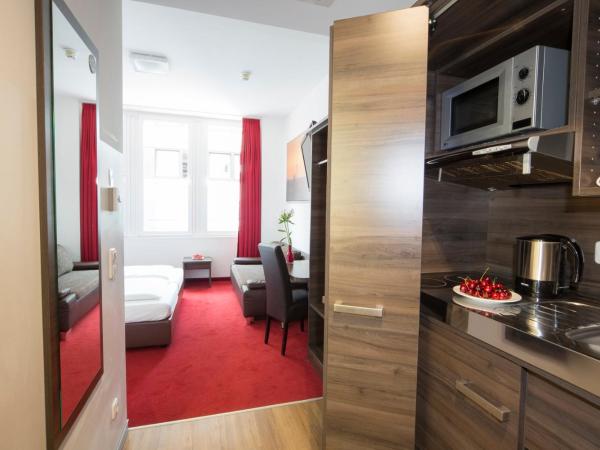 KOOS Hotel&Apartments - City Aparthotel : photo 9 de la chambre appartement 1 pièce (studio 4 adultes)