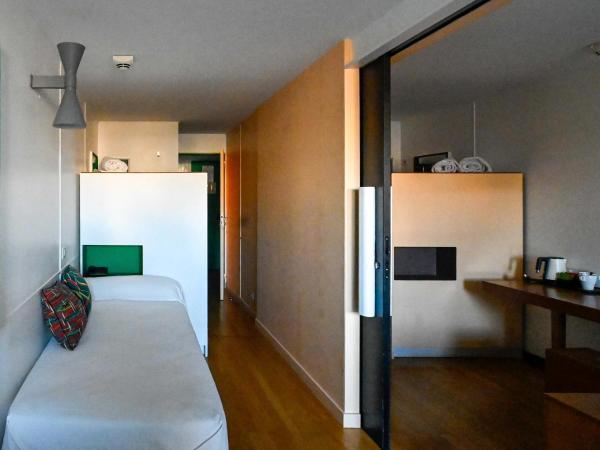 Hotel le Corbusier : photo 4 de la chambre chambre triple - vue sur jardin