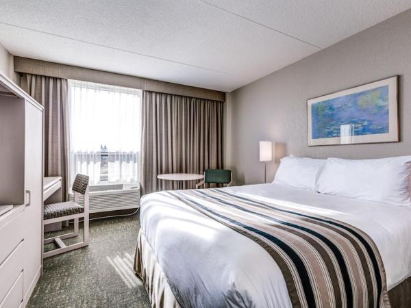 Heritage Inn Hotel & Convention Centre - Saskatoon : photo 1 de la chambre chambre lit queen-size 