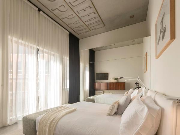 Hotel Tipografia do Conto by Casa do Conto : photo 2 de la chambre chambre double ou lits jumeaux de luxe avec balcon et vue sur le jardin