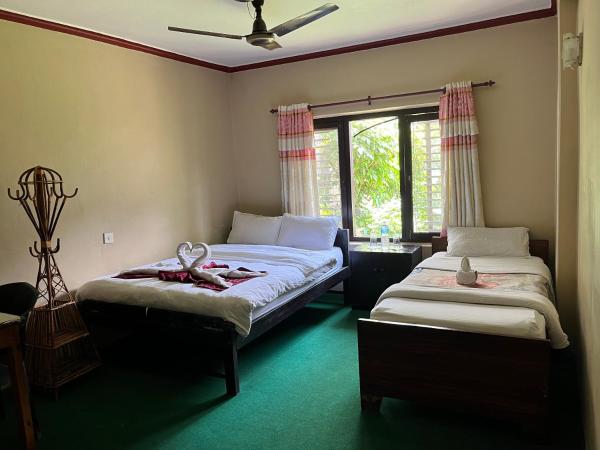Nepali Cottage Guest House : photo 9 de la chambre chambre deluxe double ou lits jumeaux