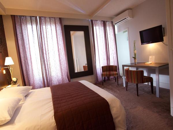 Hotel Les Negociants : photo 3 de la chambre chambre triple